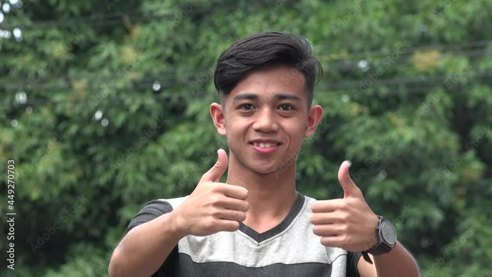 Teen Asian Boy Thumbs Up In Agreement Teen Asian Boy Thumbs Up In Agreement