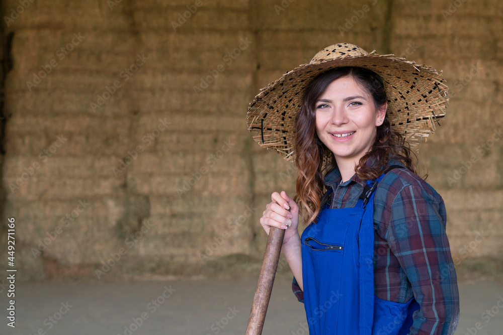 portrait of a young woman on a traditional farm in the countryside