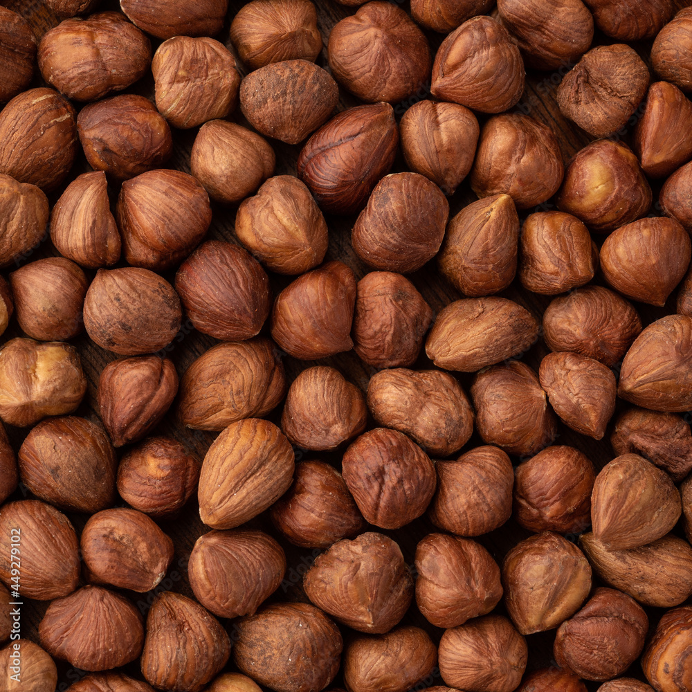 Closeup top view of hazelnuts. Food backdrop Closeup top view of hazelnuts. Food backdrop