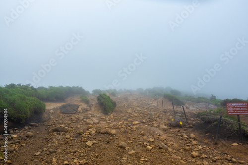 大分県玖珠郡九重町、竹田市久住町のくじゅう連山を登山している風景 A scene of climbing the Kujyu mountain range in Kusu-gun, Kokonoe-machi and Takeda-shi, Oita Prefecture.  photo