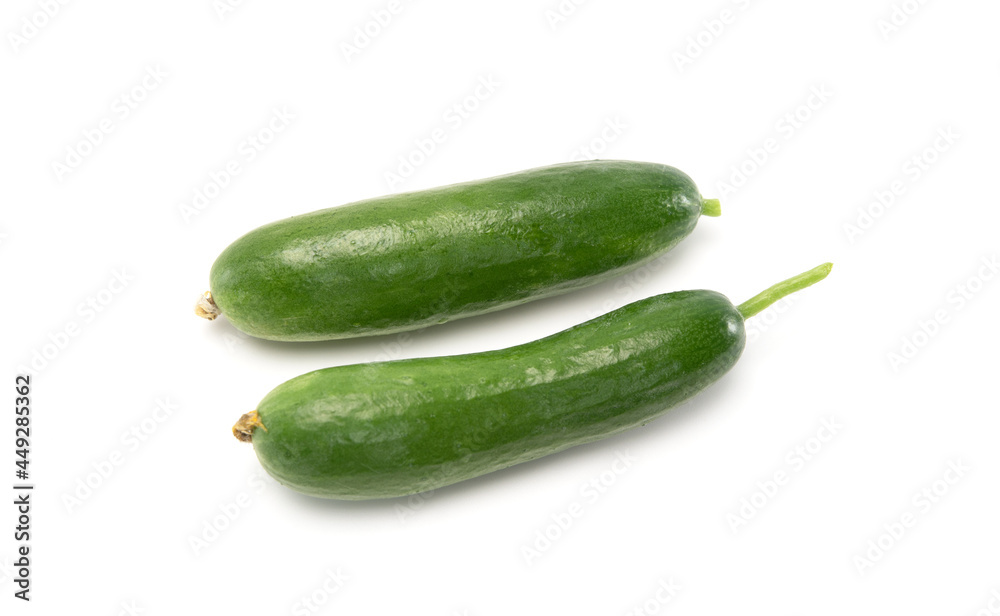 Fresh mini cucumbers isolated on white background. Healthy food Fresh mini cucumbers isolated on white background. Healthy food