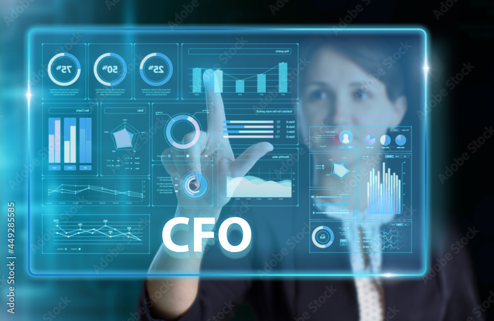 Fototapeta premium Business, Technology, Internet and network concept. Young businessman working on a virtual screen of the future and sees the inscription: CFO