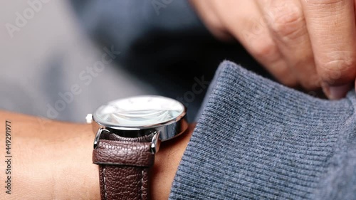Man checking time in his watch - Close-up