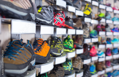 Image of large selection of sport color shoes in shop..