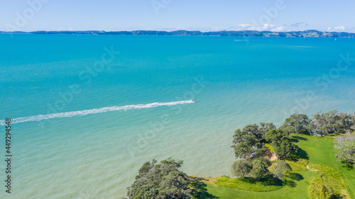 Fototapeta Naklejka Na Ścianę i Meble -  Aerial View of Boat in Grahams Beach in New Zealand - Auckland Area