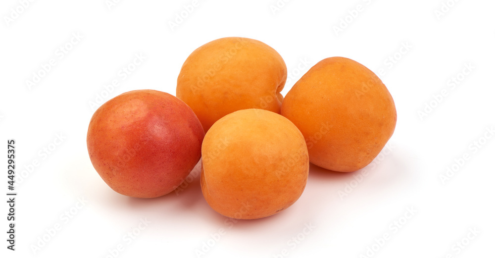 Sweet juicy yellow apricots, ripe nectarines, isolated on white background. High resolution image. Sweet juicy yellow apricots, ripe nectarines, isolated on white background. High resolution image.