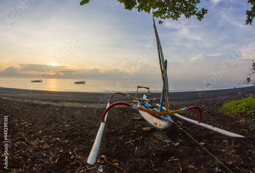 Traditional Boat on the Beach in the morning in Bali , Indonesia