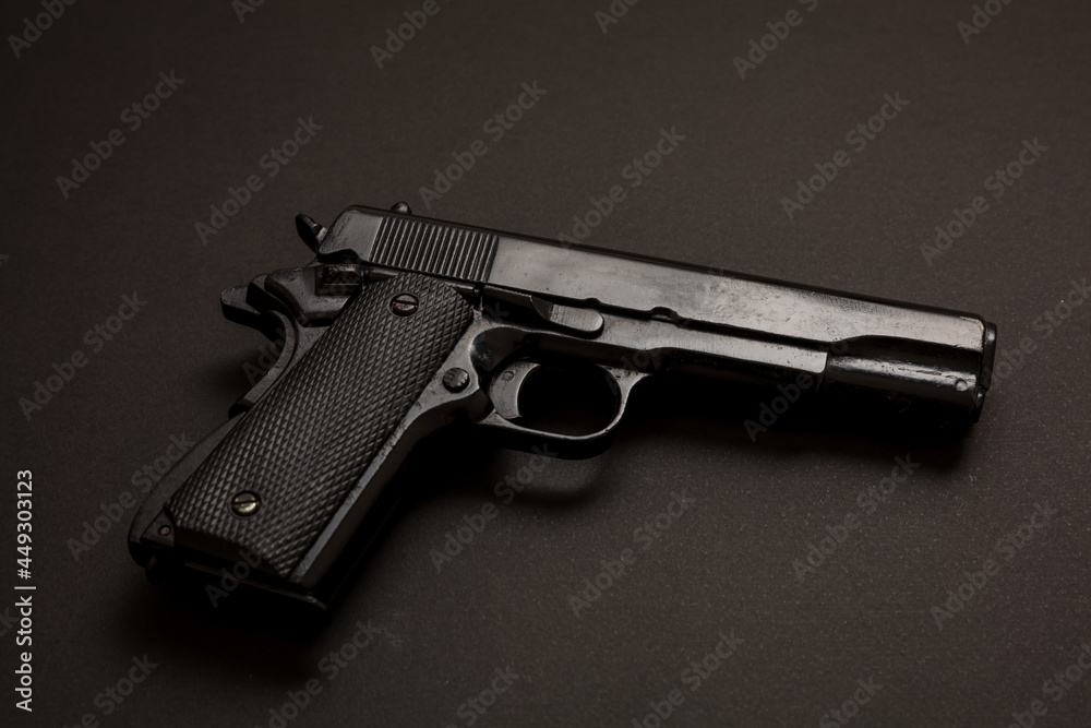 Pistol gun 9mm on black color background. Auto metal weapon side view Pistol gun 9mm on black color background. Auto metal weapon side view