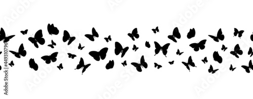 Flying black silhouettes of butterflies seamless horizontal banner. Vector illustration
