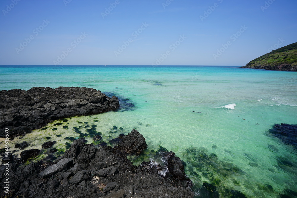 a beautiful seaside landscape with clear bluish water a beautiful seaside landscape with clear bluish water