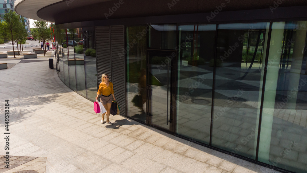 Happy woman shopping for clothes Happy woman shopping for clothes