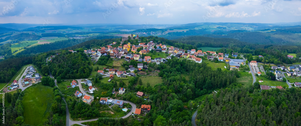 Aerial view of the village Leuchtenberg in Germany, on a cloudy day in Spring