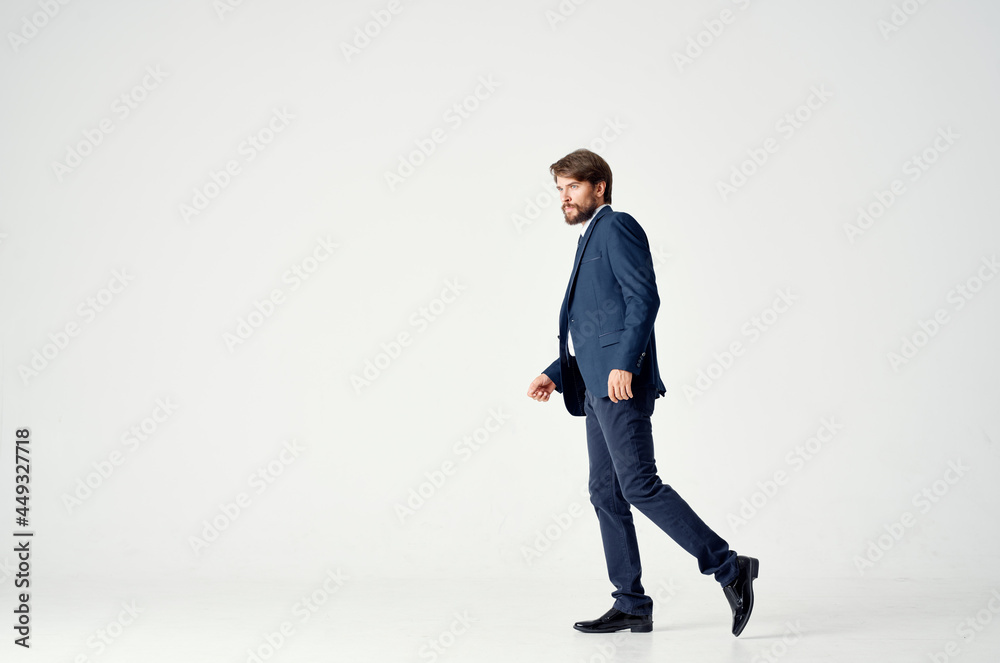 The man in a suit movement Jump office Studio The man in a suit movement Jump office Studio