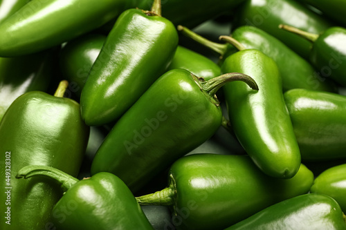 Bild auf Leinwand Green jalapeno peppers as background, closeup