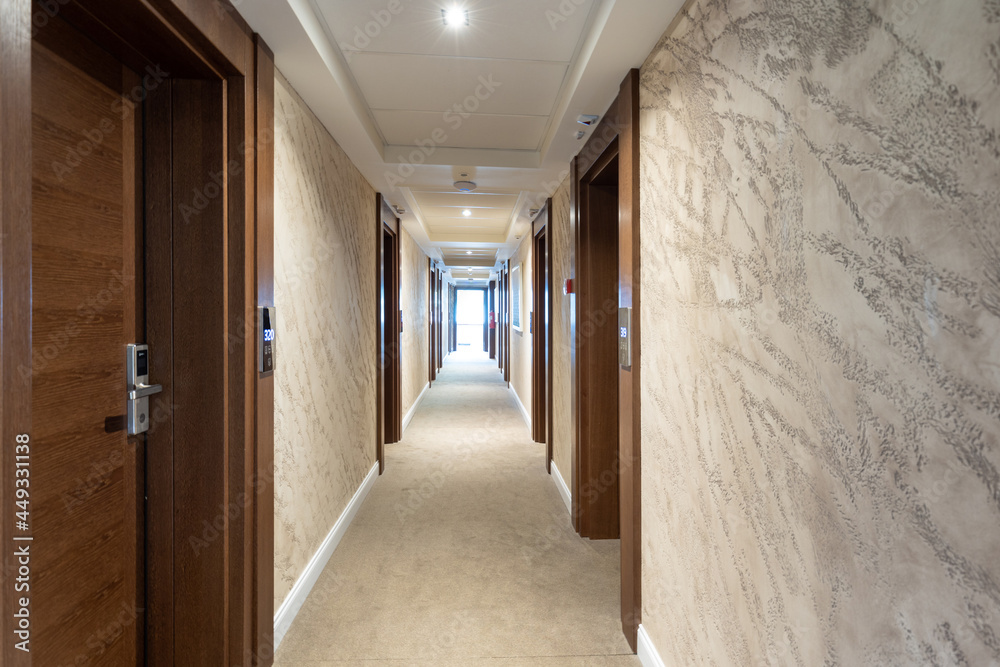 Interior of a long hotel corridor doorway