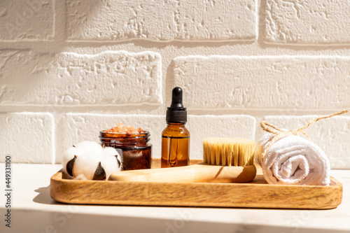 Natural organic SPA beauty products set on wooden tray on white background. Sustainable lifestyle concept