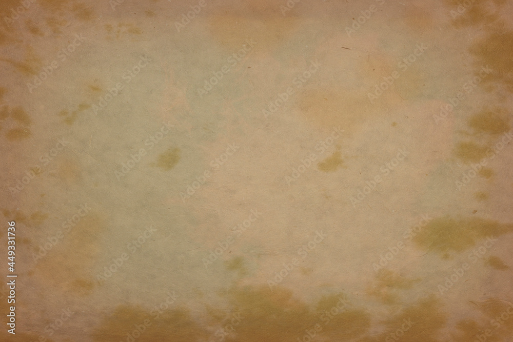 The texture of old oily paper with yellow spots. The texture of old oily paper with yellow spots.