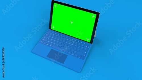 Rotating 3d illustration render Laptop similar to microsoft surface pro and Tracking markers on blue background photo