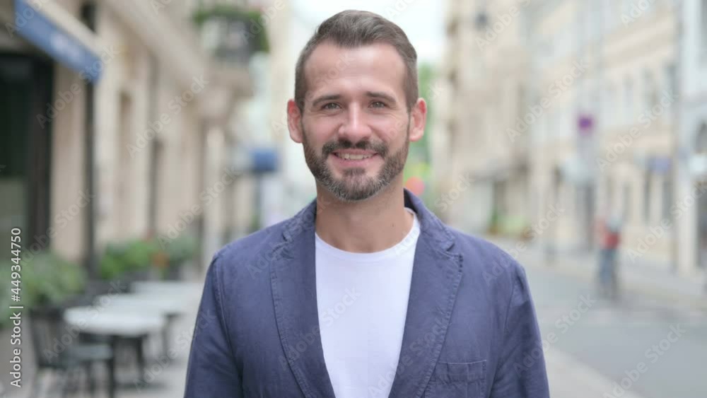 Outdoor Portrait of Man Waving, Welcoming Outdoor Portrait of Man Waving, Welcoming