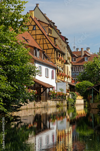 COLMAR, FRANCE, June 27, 2021 : Petite Venise district houses. Petite Venise is a picturesque tourist area, named after Venice, Italy, for picturesque historical organization around its canals.