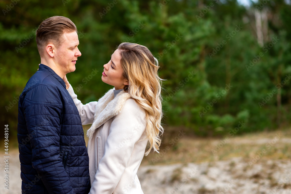 Fototapeta premium Happy loving couple enjoying of happiness love and tenderness, dating, romance.Couple hugging in love at spring park.