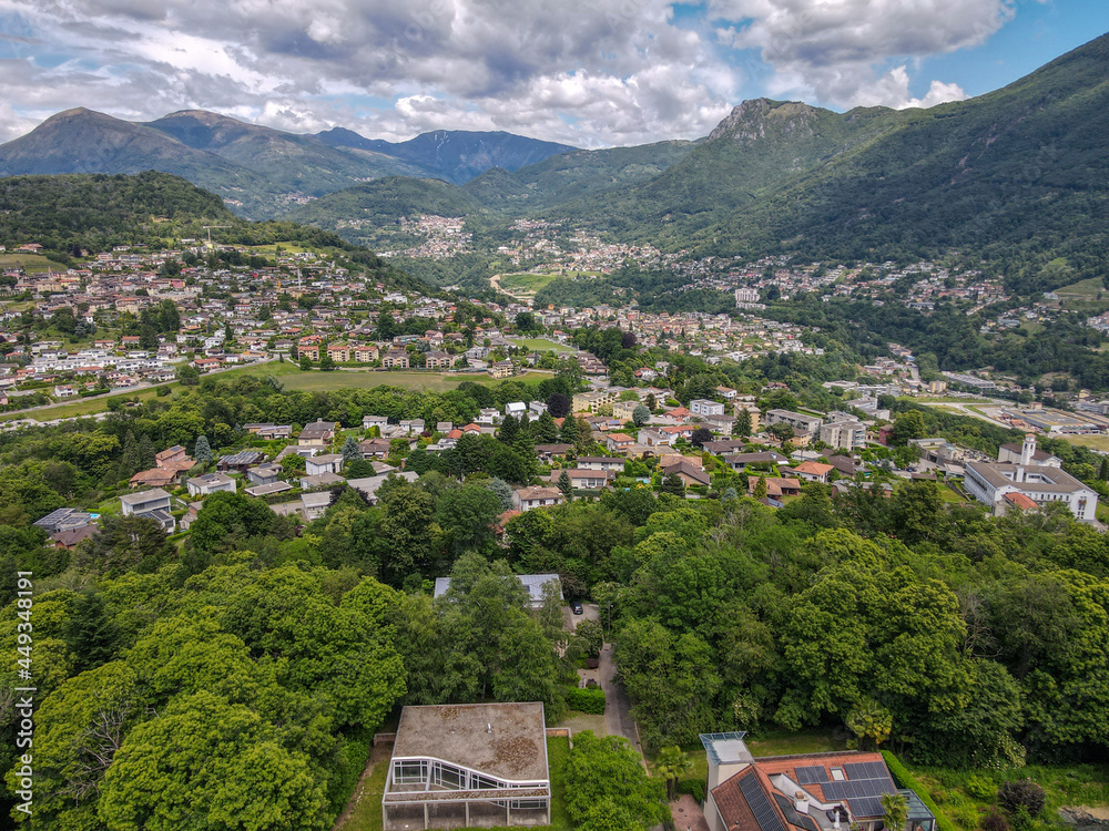 Drone view at Porza and Colla valley over Lugano on the italian part of Switzerland