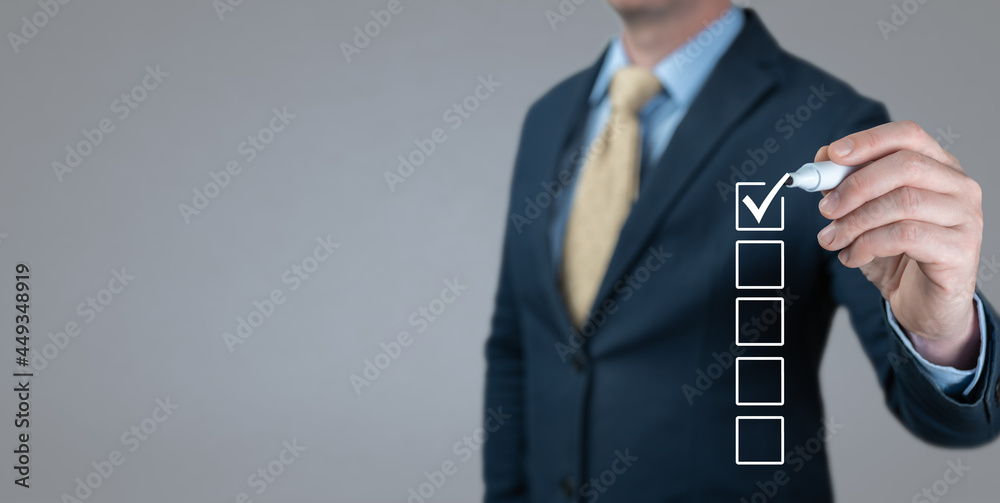 Businessman Making Right Decision. Blank checklist on the whiteboard