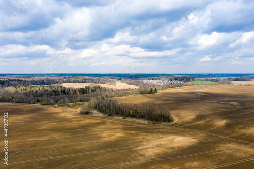 Aerial view of agricultural landscape with fields in spring season.