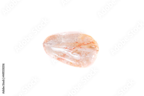 Macro mineral stone Rutile in quartz on a white background