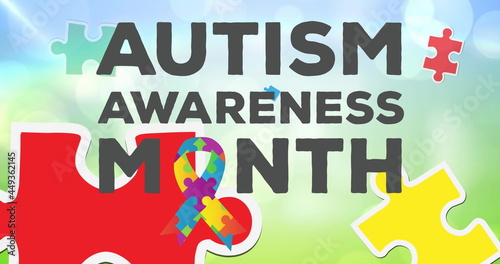 Image of autism awareness month text with puzzles forming ribbon on blue background