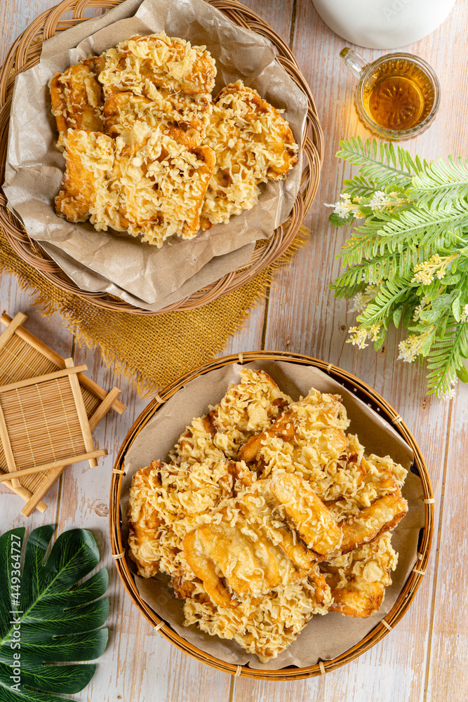 Stockfoto med beskrivningen Pisang goreng is a fritter made by deep