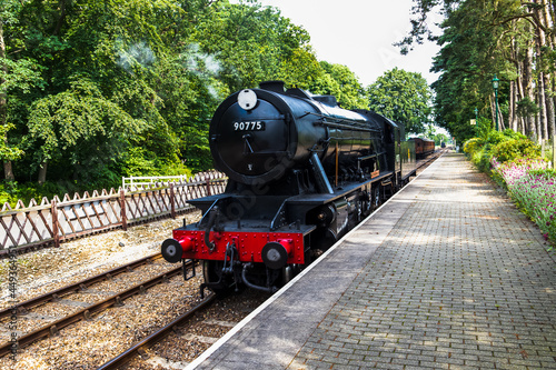 Fotografija North Norfolk Railway steam train standing at Holt Station