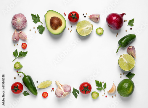 Frame of fresh guacamole ingredients on white background, flat lay. Space for text