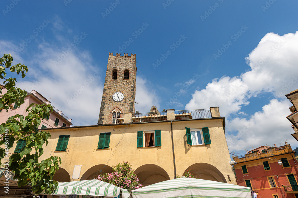 Downtown of Monterosso al Mare village. Bell tower of the Church of Saint John the Baptist, XIII century, Cinque Terre National park in Liguria, La Spezia province, Italy, Europe.