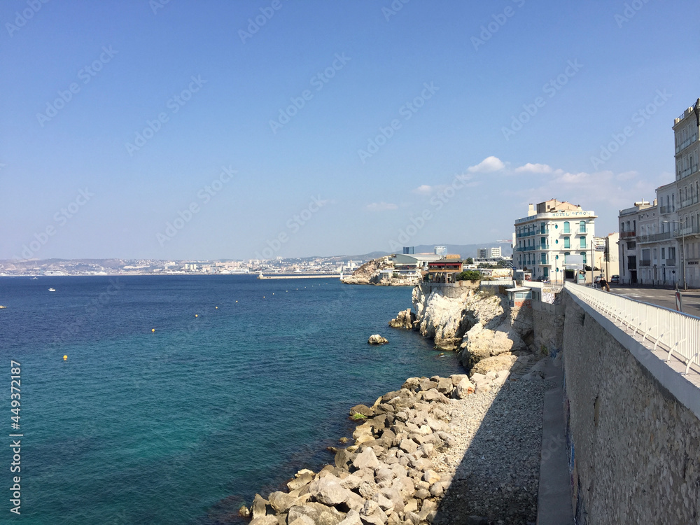 View of the Bay of Marseille and the Mediterranean coastline from the Kennedy Corniche in the Endoume neighborhood in Marseille, France.