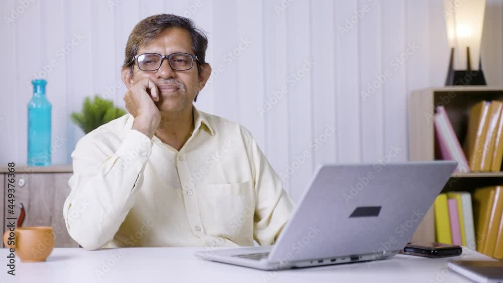 Businessman thinking before before entering or typing on laptop while working at office - concpet of remembering forget password, finding solutions for problem and planning for future. Businessman thinking before before entering or typing on laptop while working at office - concpet of remembering forget password, finding solutions for problem and planning for future.