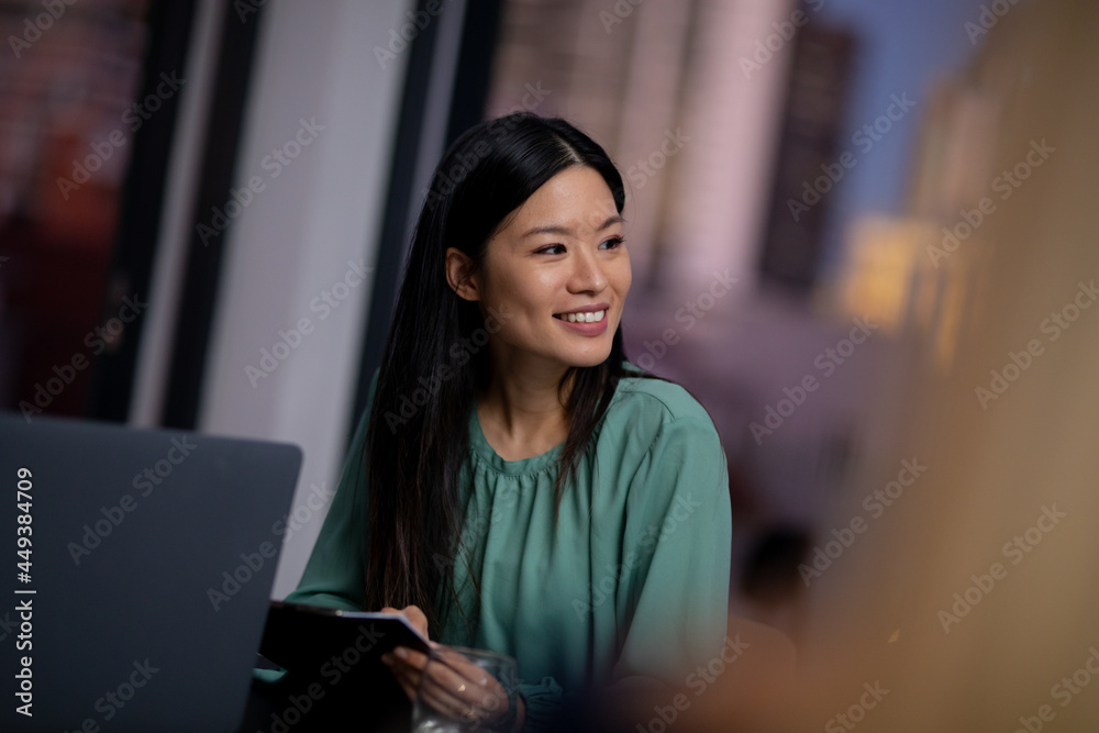Diverse group of business colleagues working at night having meeting Diverse group of business colleagues working at night having meeting