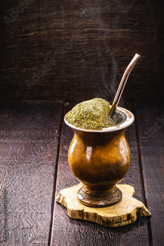 Chimarrão with yerba mate, a traditional drink from Brazil and South America, served hot. photo