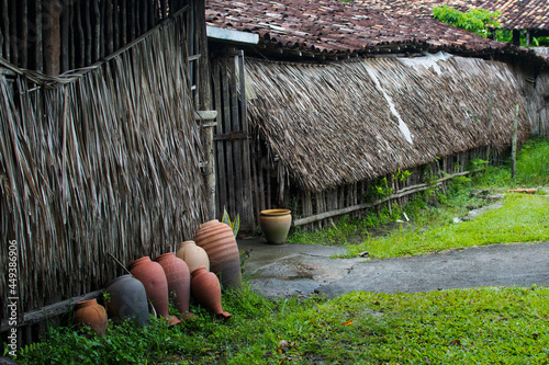 house with thatched roof in the city of Maragogipinho photo