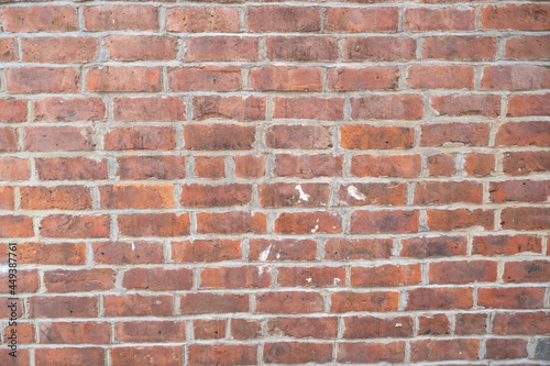 Brick wall background, orange natural baked brick wall texture