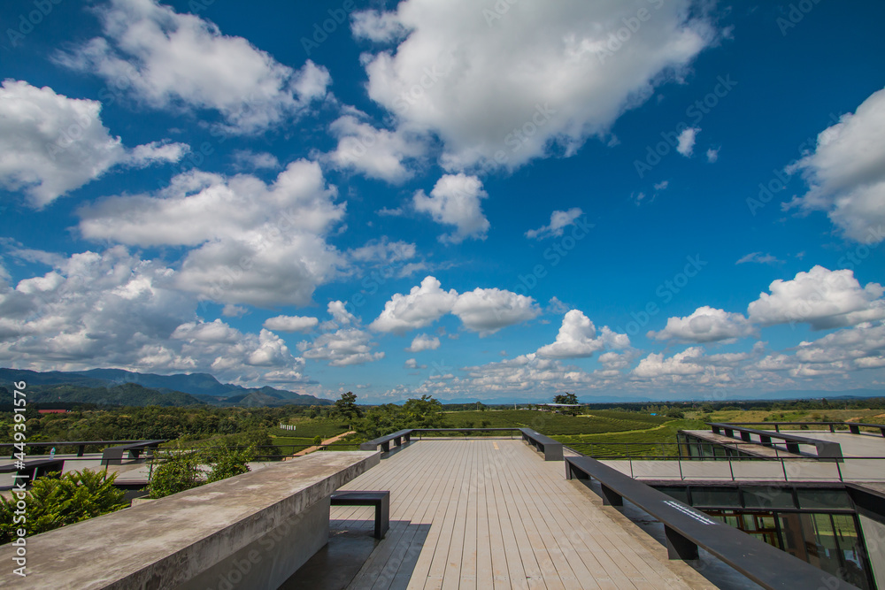 Naklejka premium green farm sky clouds beautiful mountains good weather