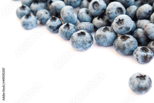 Blueberries ripe and tasty on a white background.