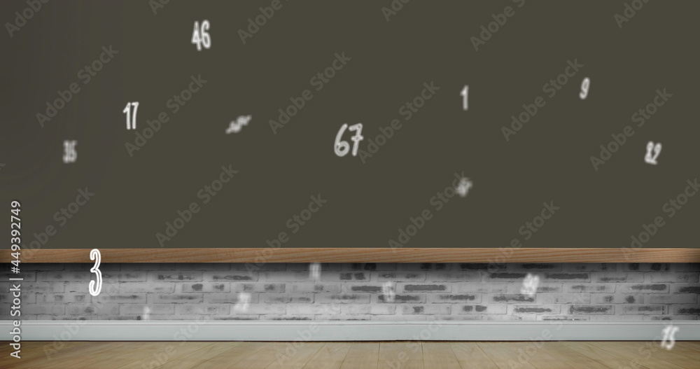 Digital image of multiple numbers and symbols floating against brick wall Digital image of multiple numbers and symbols floating against brick wall