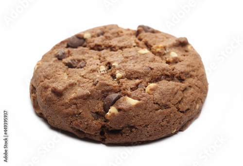 Round chocolate and hazelnut cookies isolated on white background