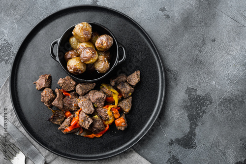 Bangin beef stew, on gray stone background, top view flat lay, with copy space for text