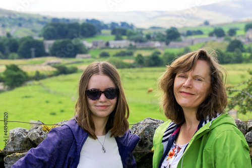 Mother and daughter backpacking in Hardraw, Wensleydale, Yorkshire Dales, England.