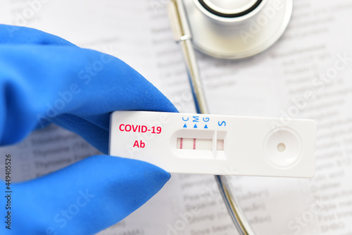 COVID-19 IgM antibody positive by using COVID-19 antibody rapid test kit photo