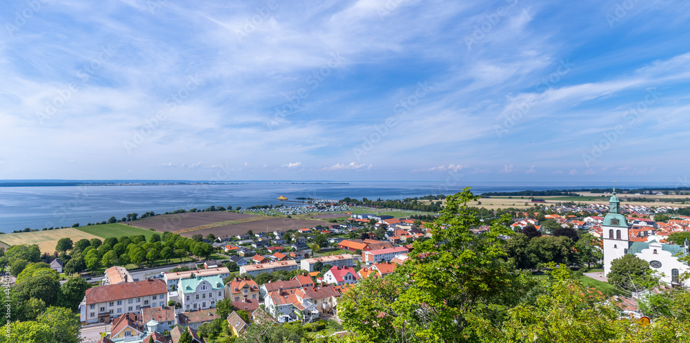 The town of Gränna in Sweden as seen from the Gränna mountain with Lake Vättern and Vising island in the horizon