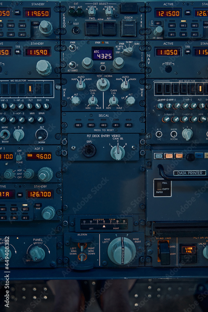 Flight controls on the dashboard used by professional aviators Flight controls on the dashboard used by professional aviators