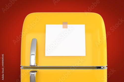 blank memo note sticker on yellow refrigerator close up. blank paper reminder on retro fridge door close up mockup on red wall
